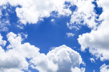 Fototapeta premium White cloud over clear blue sky, sunny summer day light