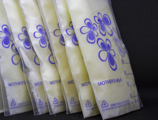 Pumped frozen breastmilk for feeding baby