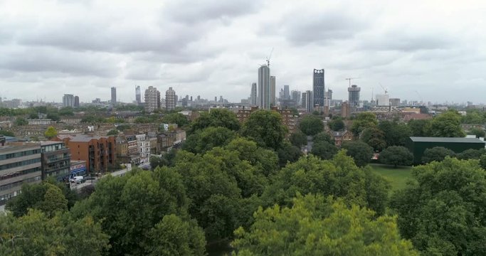 Aerial ascending view of the skyline of central London from the South