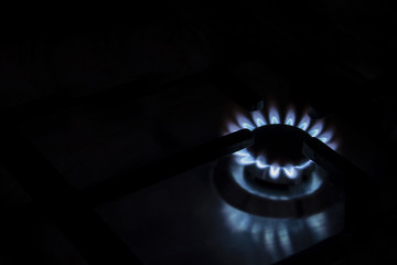 Fire of gas stove on a black background