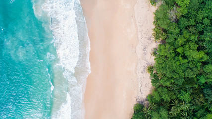 Sea Aerial view, Top view,amazing nature background.The color of the water and beautifully bright.Azure beach with rocky mountains and clear water of Thailand ocean at sunny day.flying drone,sea view