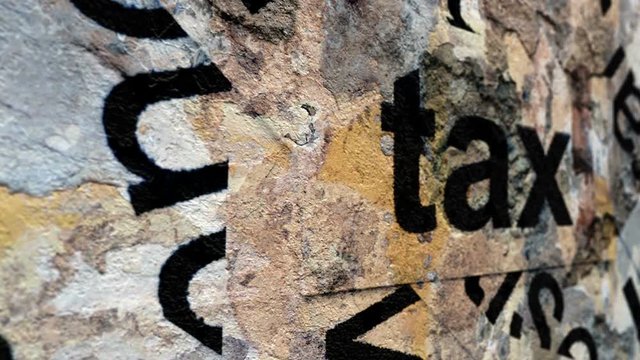 Tax tag on grunge background