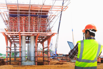 Naklejka premium Engineers working in road construction design.