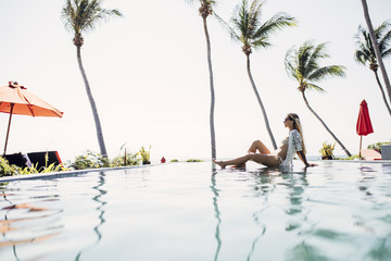 Woman Enjoying Summertime at Exotic Resort