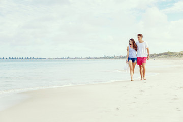 Romantic young couple on the beach