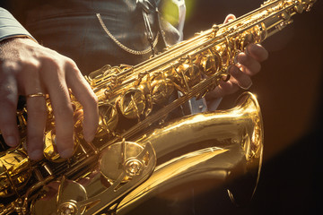 Young man playing the Saxophone