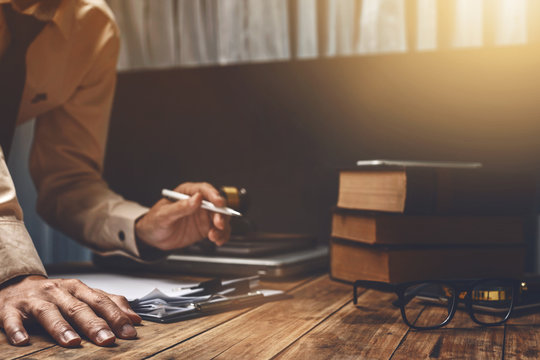 Lawyer Working Hard His Job Paperwork  At Office, Vintage Picture Style.