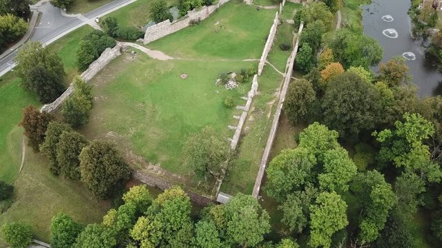 ruins of an ancient medieval castle Dobele Latvia Aerial drone top view 4K UHD video
