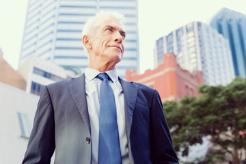 Portrait of confident businessman outdoors