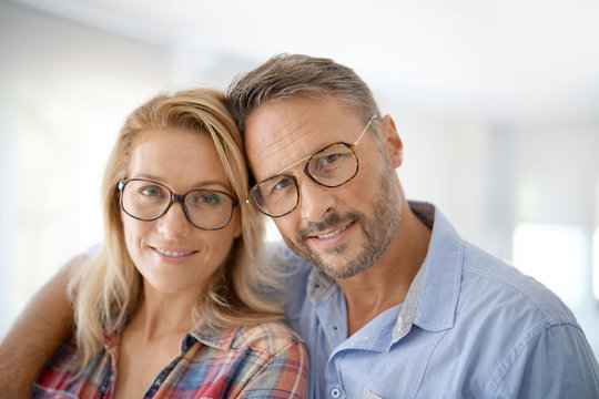Portrait of mature couple wearing eyeglasses