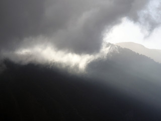mountains with dramatic storm clouds with shadows in tenerife