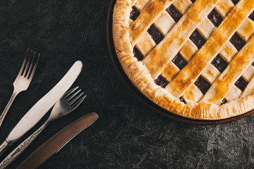 berry pie and silverware