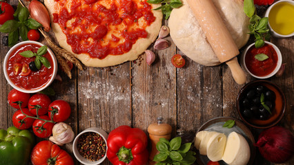 raw dough and ingredient for cooking pizza