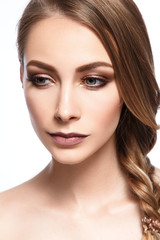 Obraz premium Beautiful woman portrait with tender make up in nude colors.