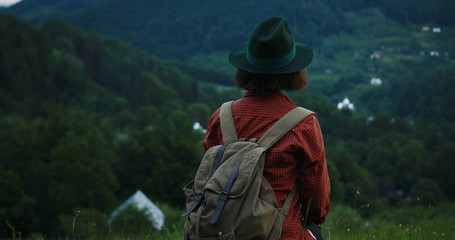 young tourist girl with backpack