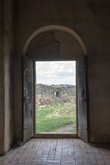 Arched door in an old stone building