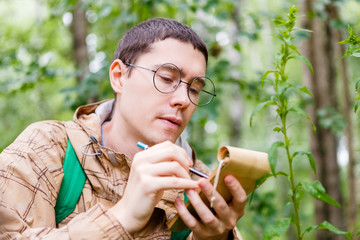 Picture of dark-haired biologist with glasses