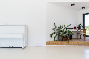 Bright room with piano