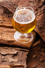 Light beer on bark