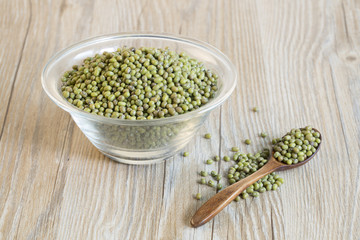 Mung beans in a glass bowl on the table.