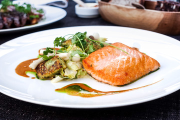 grilled salmon with sauce lettuce