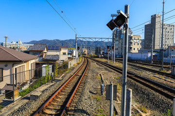 Train track at Uji Station with Mountain Backgroud.