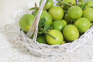 Close Up Lime in a White Basket