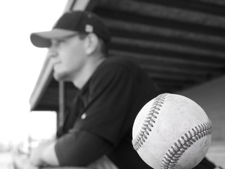 Baseball in Focus, Player in Background