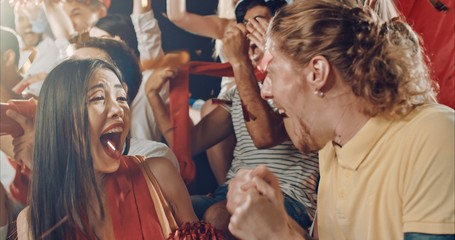 Fans cheering for sports team