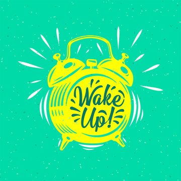 Wake up! inscription on Alarm Clock.