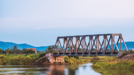 Train railway bridge cross the lake,focused on the bridge