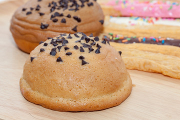 Chocolate Chips Coffee Bun on wooden plate