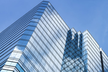 Fototapeta na wymiar Office tower made of glass and steel