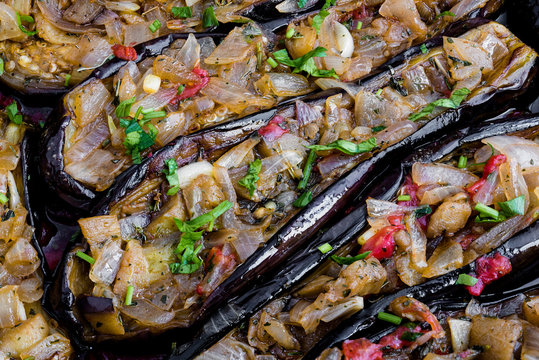 Stuffed eggplants with onions, otherwise called imam bayildi, a traditional dish of Greece, Turkey and other Middle East countries