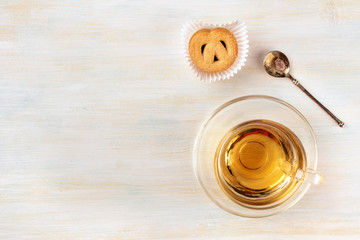 Cup of tea with Danish butter cookie and copyspace