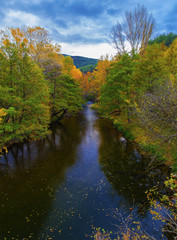 Beautiful landscape with river and colorful autumn forest