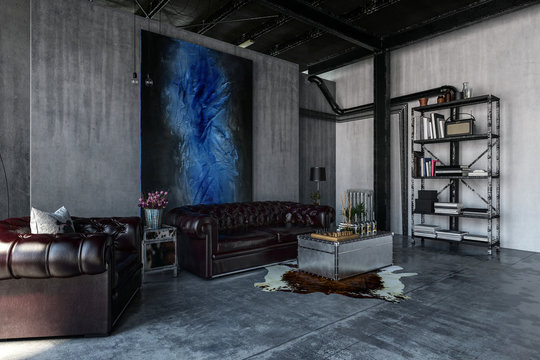 Industrial, modern polished concrete living room