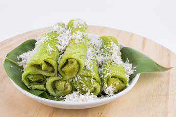 Malaysian traditional cake (Dadar gulung or Ketayap) made from flour, coconut steeped,palm sugar and pandanus flavors