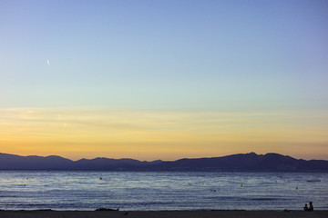 Sunset in quiet beach of l'Escala, Costa Brava.