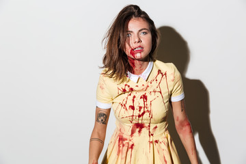 Mad insane zombie woman looking at camera
