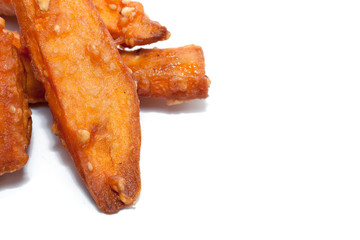 deep-fried sliced sweet potato on white background