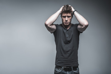 Naklejka premium Worried young man has problems