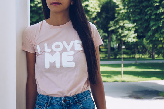 Girl Is Wearing T-shirt With A Text 