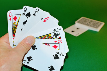 The cards in their hands.