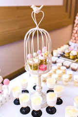 Elegant and luxurious event arrangement with colorful pastries