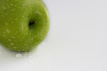 green apple on white background.