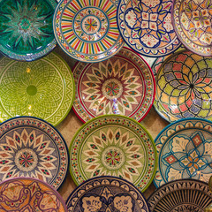 Set of ethnic dishes. Wall dish background