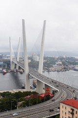 Image of sea bay with buildings, bridge