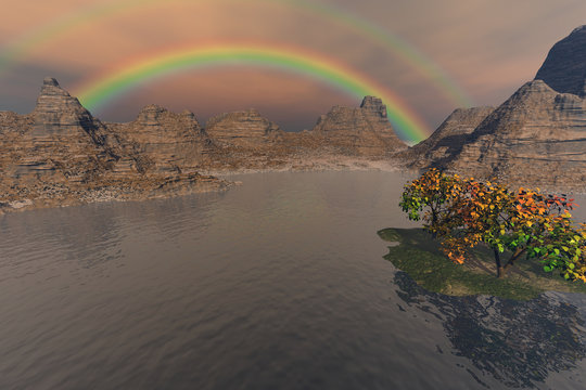 Rainbow, a rocky landscape, and a small island with trees on the lake.
