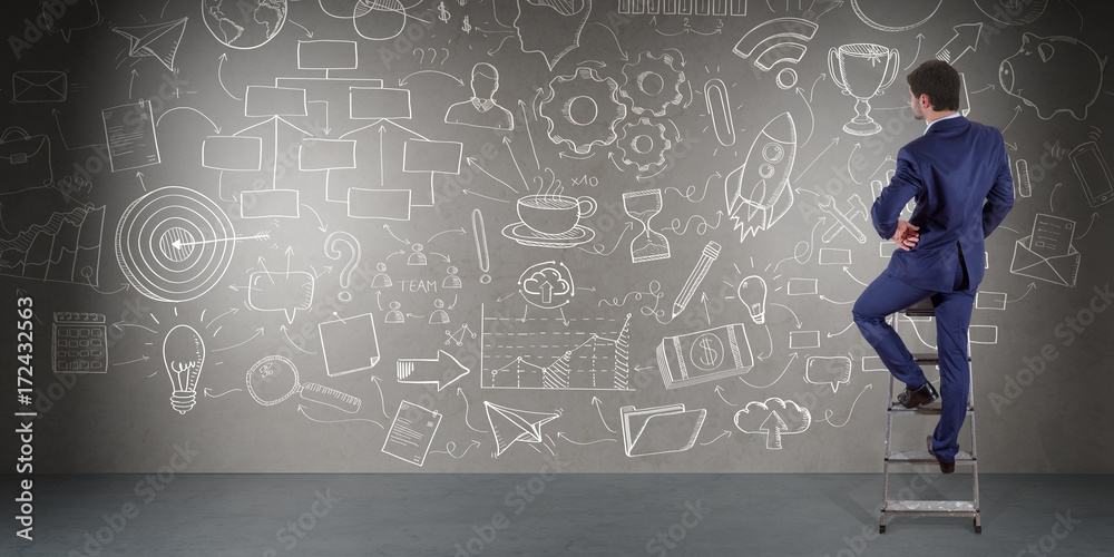 Aufkleber businessman watching a project sketch on a wall 3d rendering